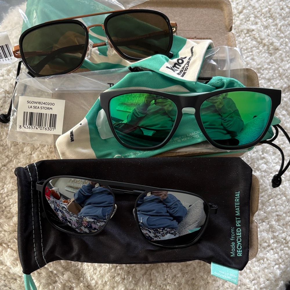 Chic Black Sunglasses with Green Lenses. Kimoa brand new all three pairs
